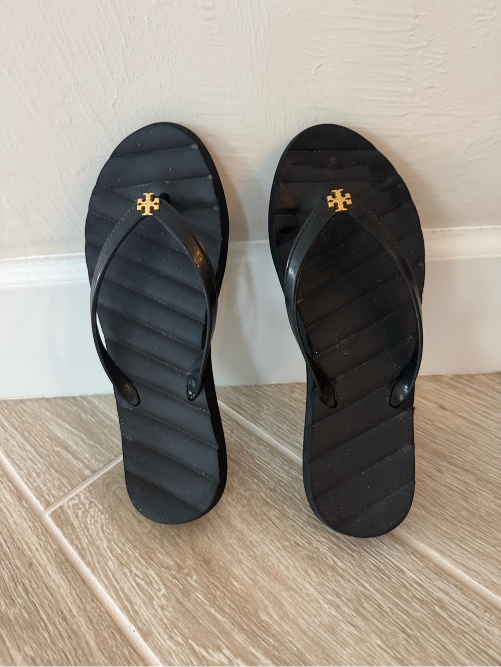 Tory Burch Black Quilted Flip Flop Sandals with Gold Logo